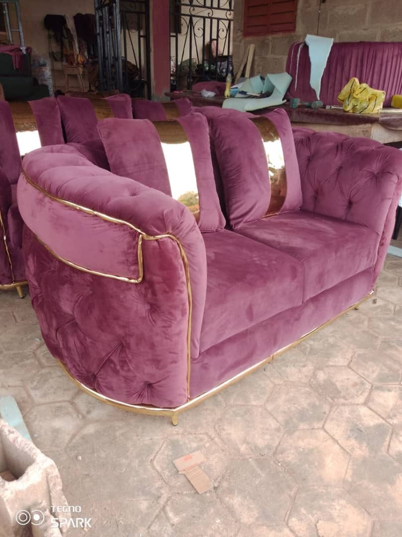 Plum velvet tufted seating with gold detail photographed at the workshop